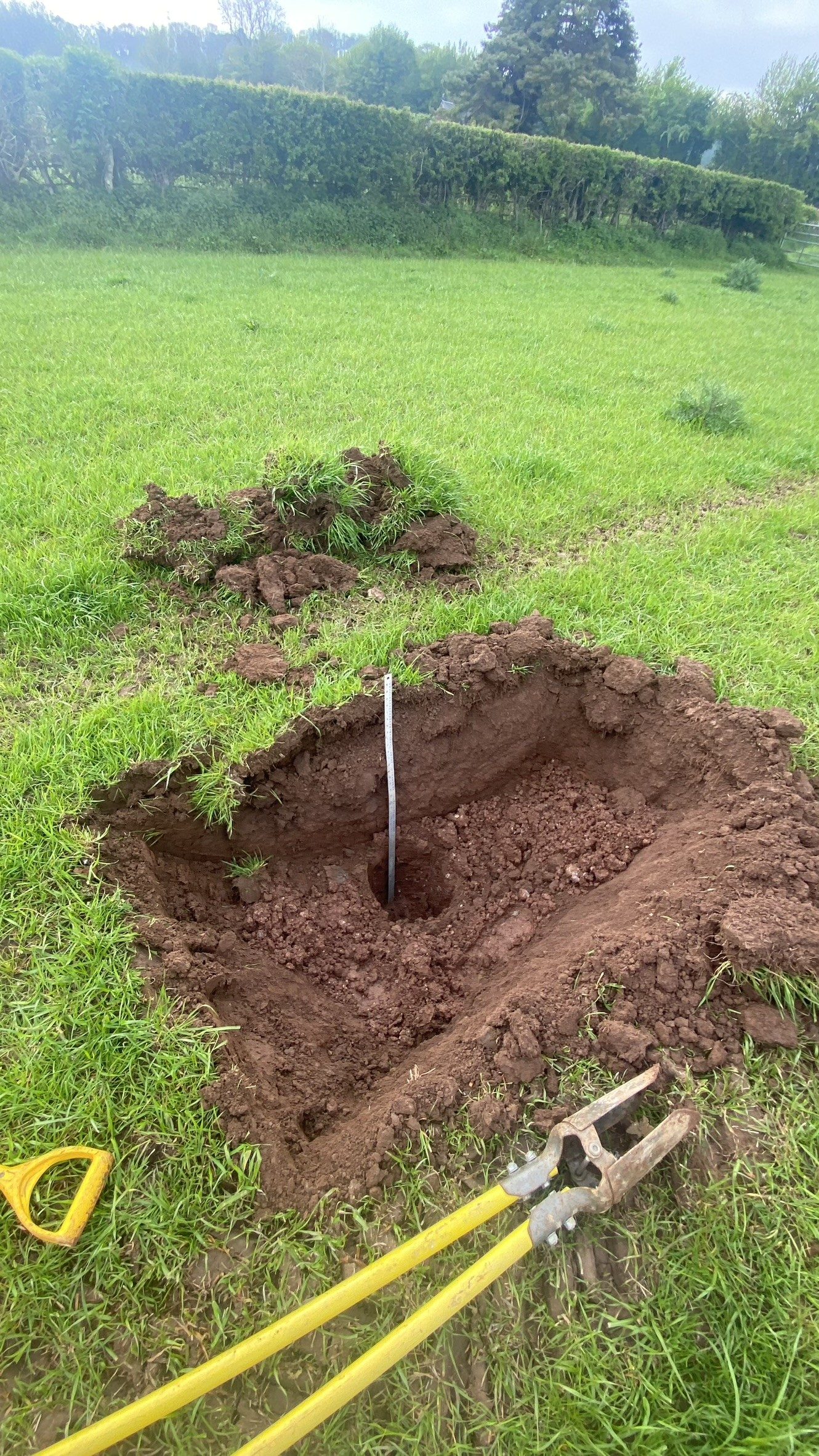 Percolation test trial pit excavated on site near Malvern