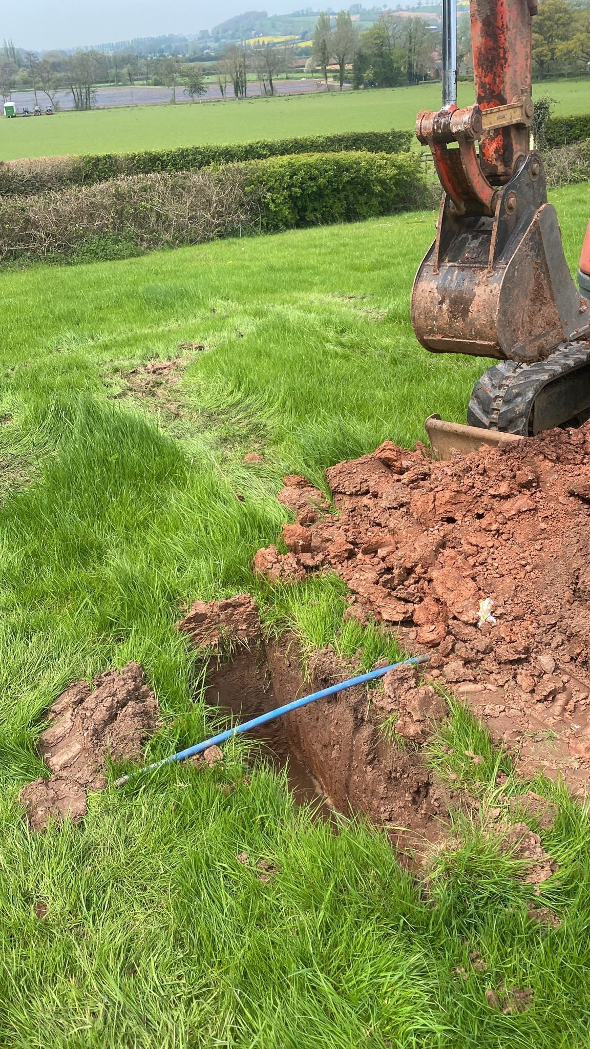 Percolation test trial pit excavated on site in Shropshire