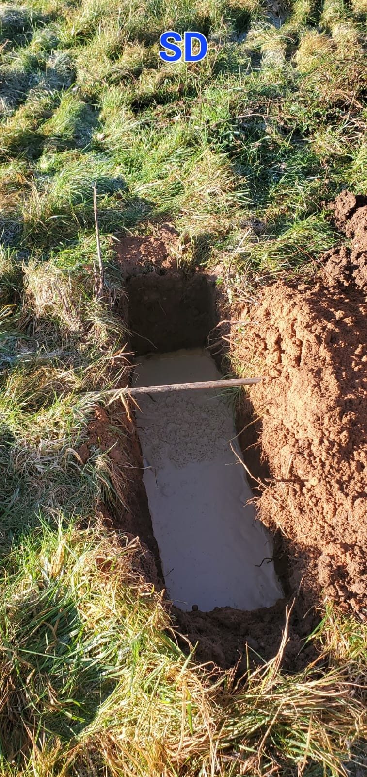 Percolation test trial pit excavated on site near Loughborough